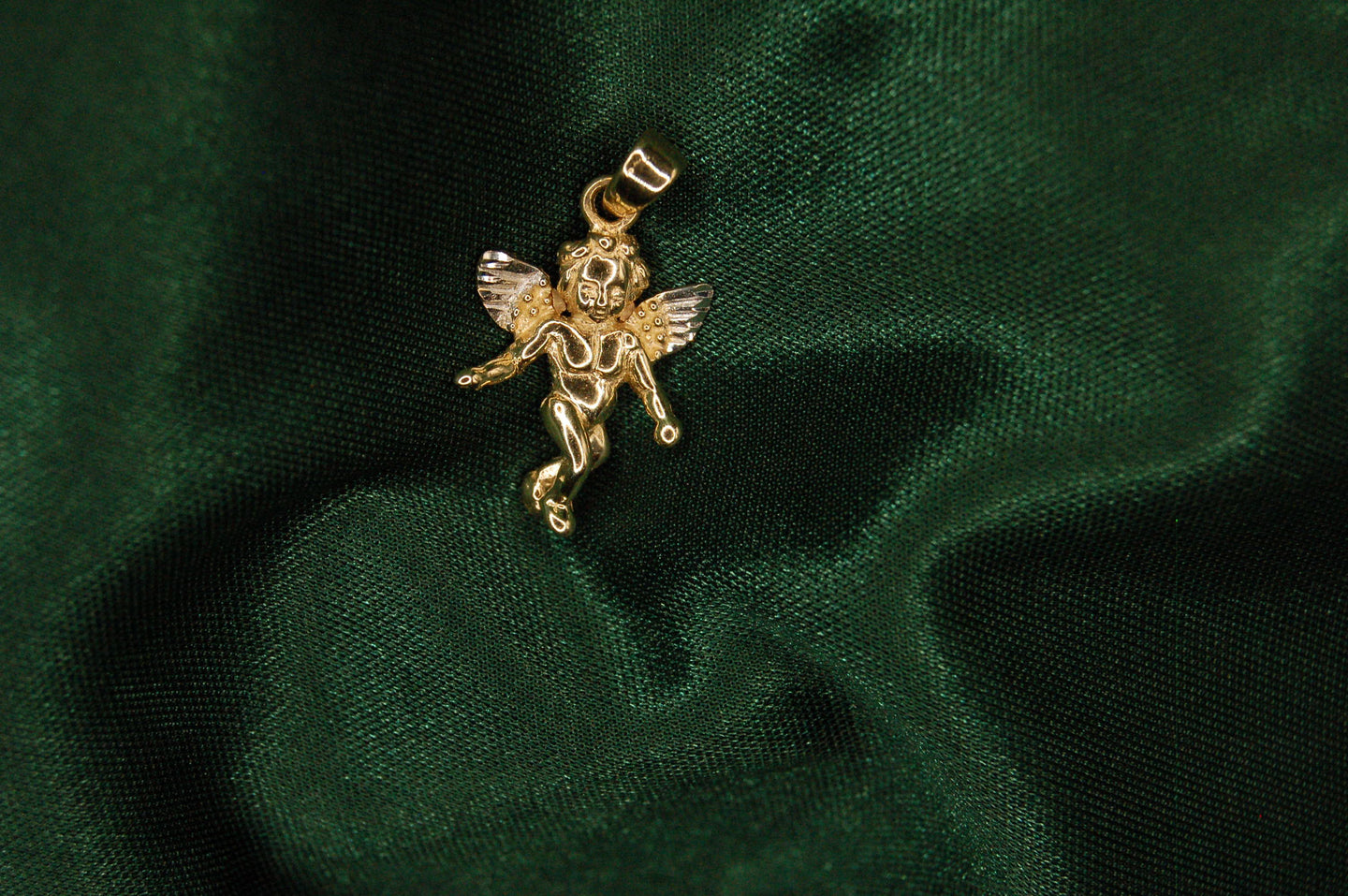 Gold angel pendant