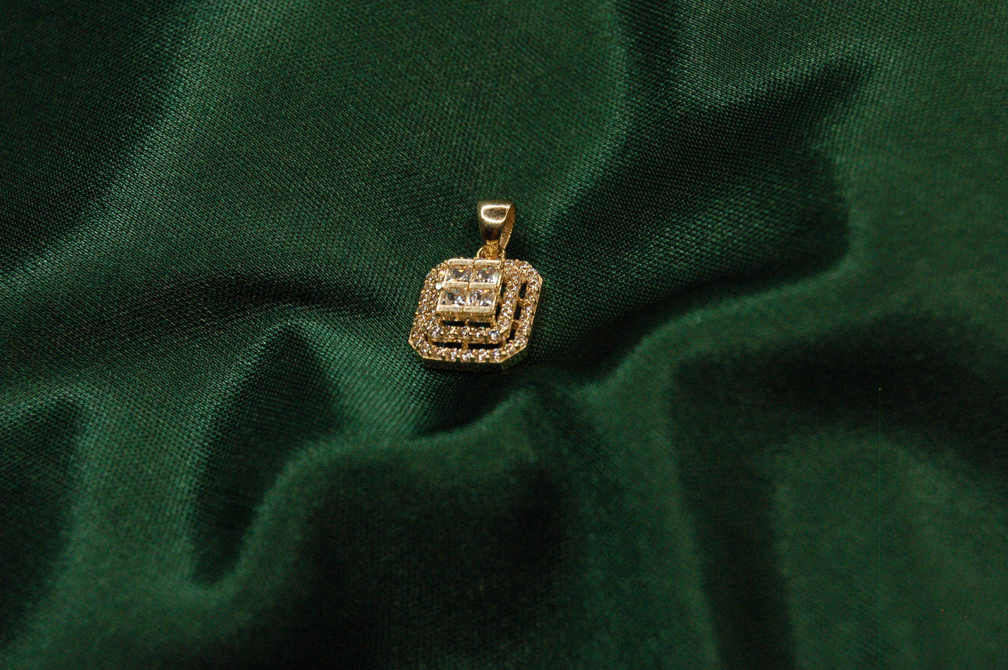 Gold square with zirconia pendant